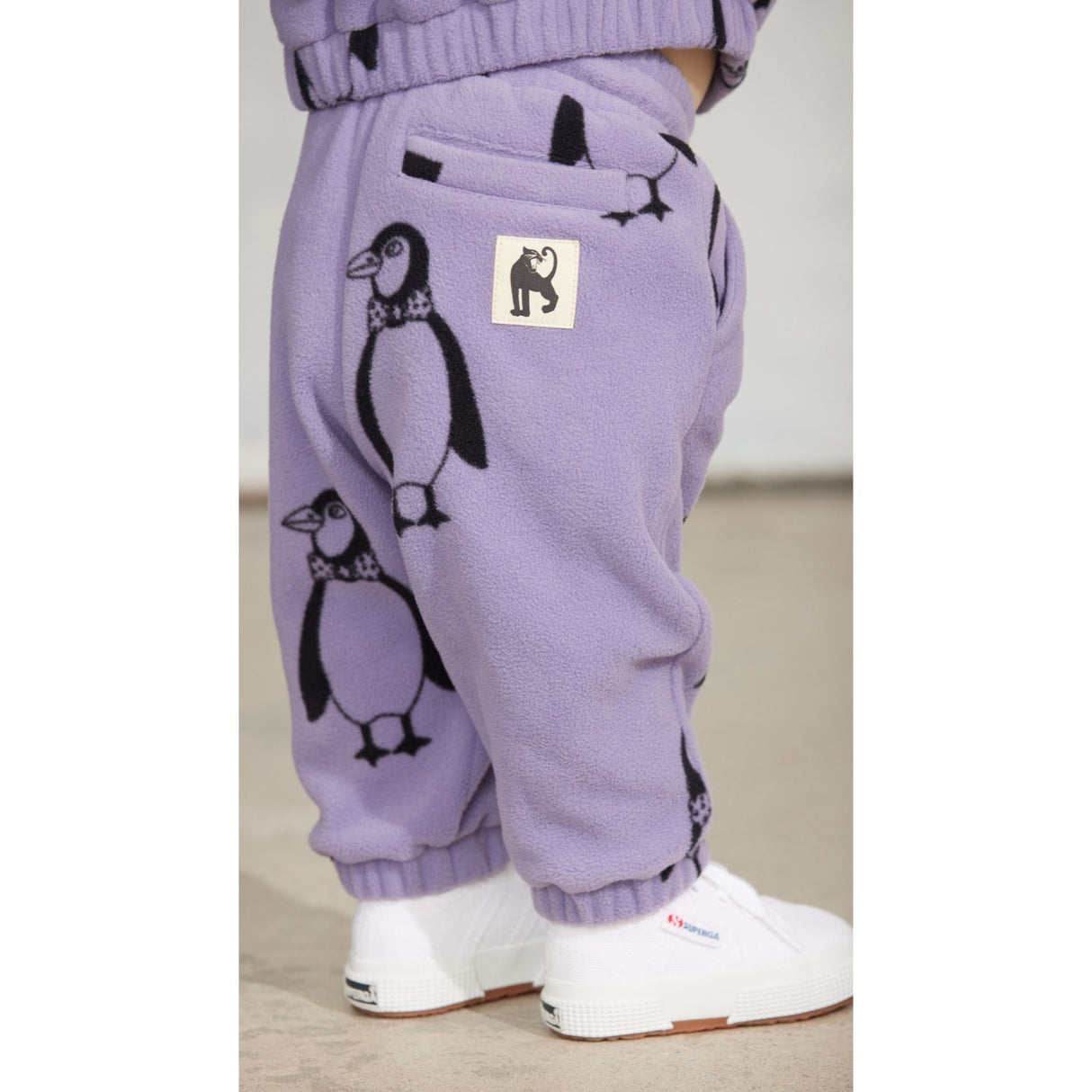 Mini Rodini Purple Penguin AOP Fleece Trousers