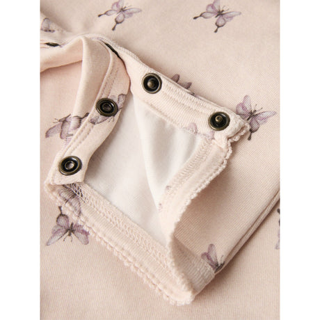 Lil'Atelier Peach Blush Butterfly Gayo Sao Strap Suit