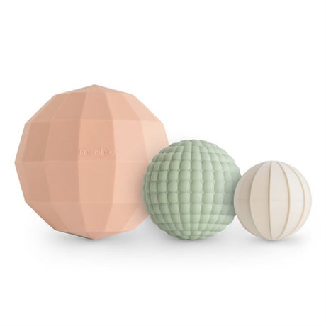 Mushie Blush ​​Nesting Spheres Sensory Toy