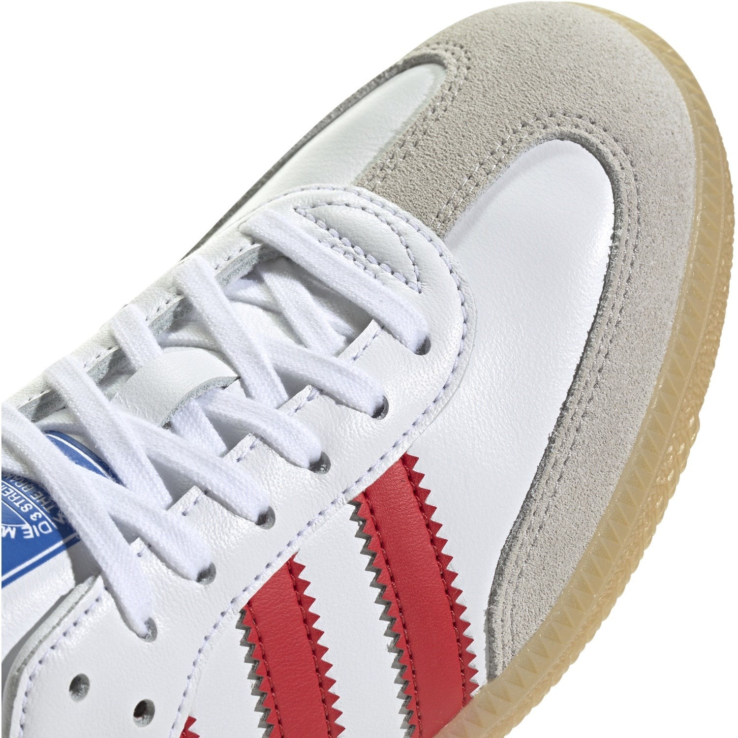 white adidas with maroon stripes