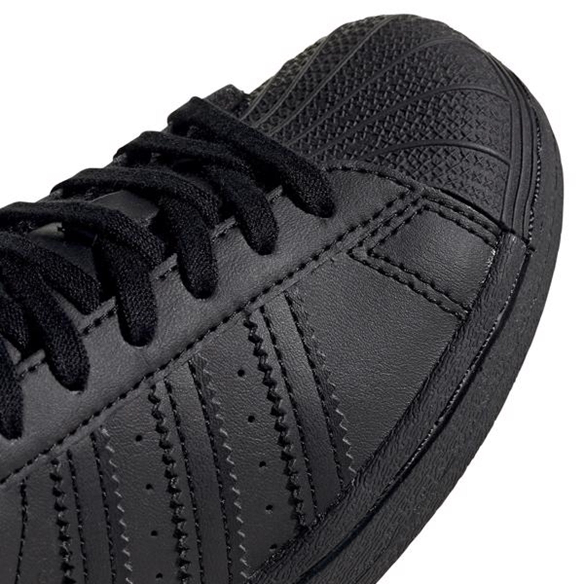 black adidas superstar shoes